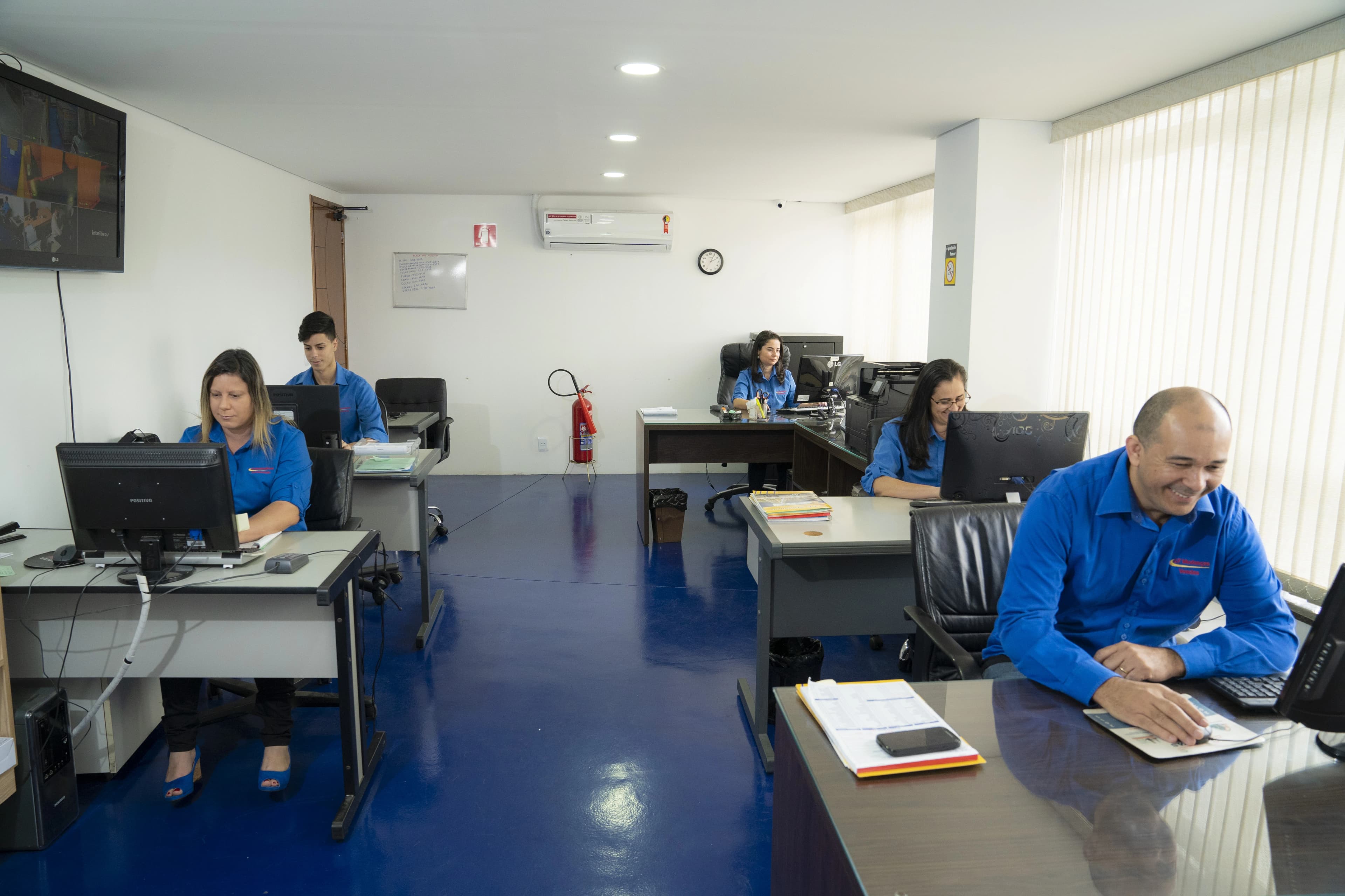 Equipe de atendimento da JF Mudanças